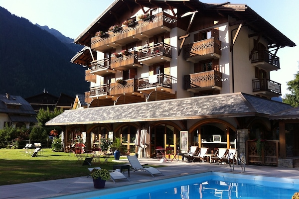 Seasonal outdoor pool, pool umbrellas, pool loungers