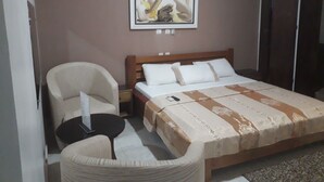 Luxury Double Room, 1 King Bed, Refrigerator, City View | Premium bedding, desk, laptop workspace, blackout drapes - Hotel Attoungblan (Yamoussoukro)