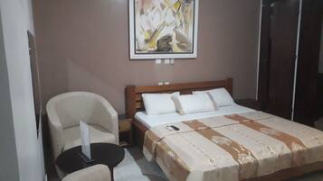Luxury Double Room, 1 King Bed, Refrigerator, City View | Premium bedding, desk, laptop workspace, blackout drapes