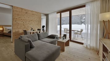 Luxury Suite, Terrace | Living room | Flat-screen TV