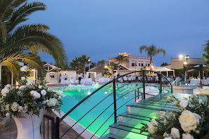 Seasonal outdoor pool, open 10:30 AM to 6:30 PM, pool loungers