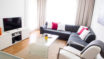Family Apartment, 2 Bedrooms | Living room | Flat-screen TV, DVD player