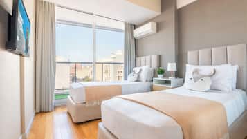 Apartamento, 2 quartos | Roupas de cama premium, edredons de pluma, camas Select Comfort