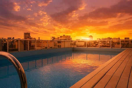 Seasonal outdoor pool, open 9 AM to 7:00 PM, sun loungers