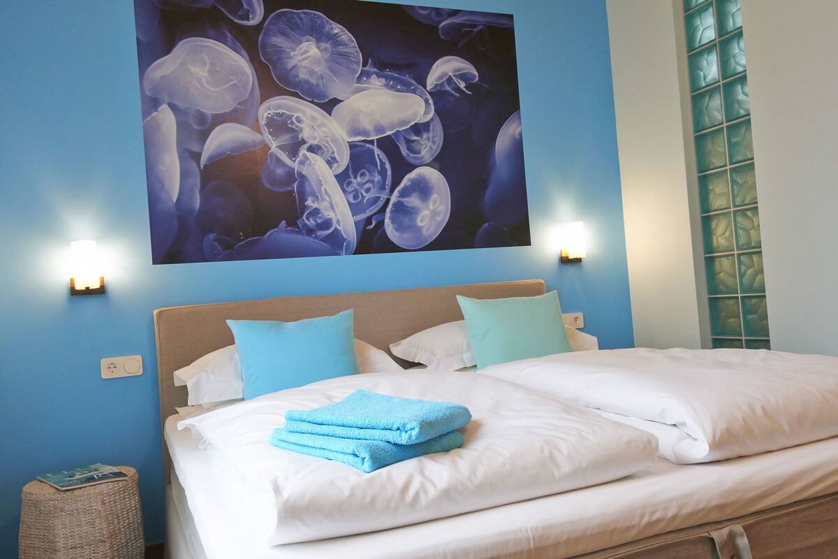 Double Room | Blackout curtains, iron/ironing board, cots/infant beds, rollaway beds