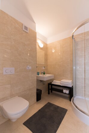 Hair dryer, slippers, towels