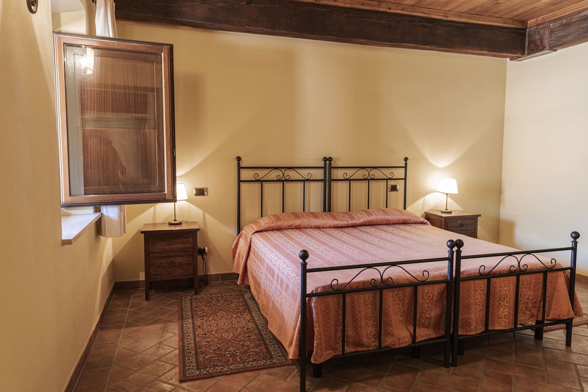Standard Apartment, 2 Bedrooms, Hill View | Cots/infant beds, bed sheets