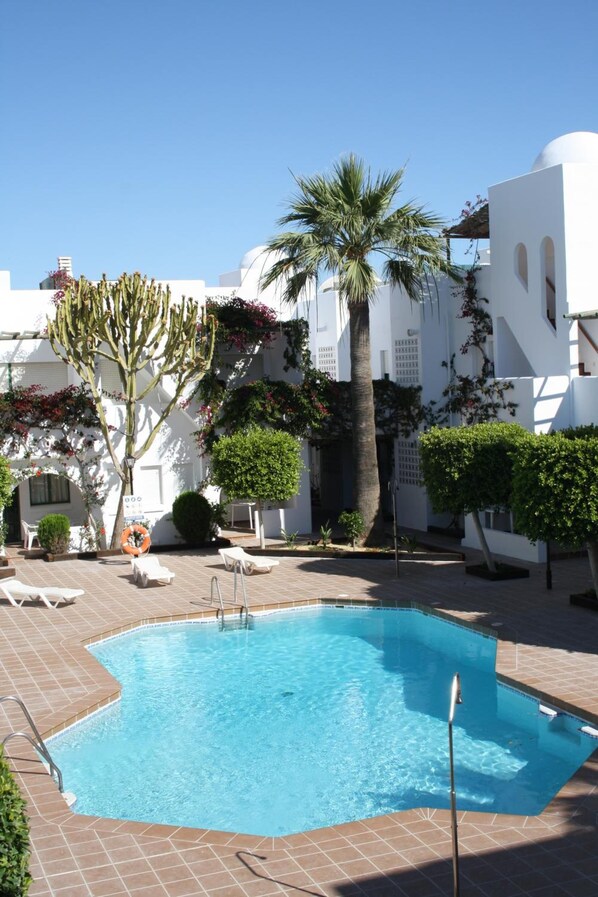 2 outdoor pools, open 11 AM to 8:30 PM, pool loungers