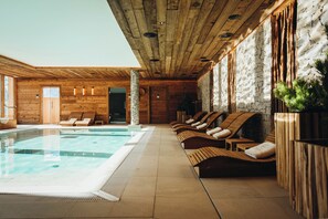 Indoor pool, open 8:00 AM to 8:00 PM, pool loungers