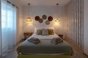 Habitació individual Deluxe | 3 dormitoris, caixa forta a l'habitació i planxa i posts de planxar