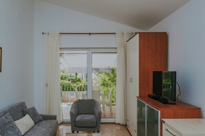 Télévision, table de tennis de table