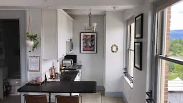 Fridge, microwave, stovetop, coffee/tea maker