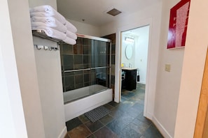 Shower, hair dryer, towels