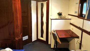Desk, blackout curtains, rollaway beds, free WiFi