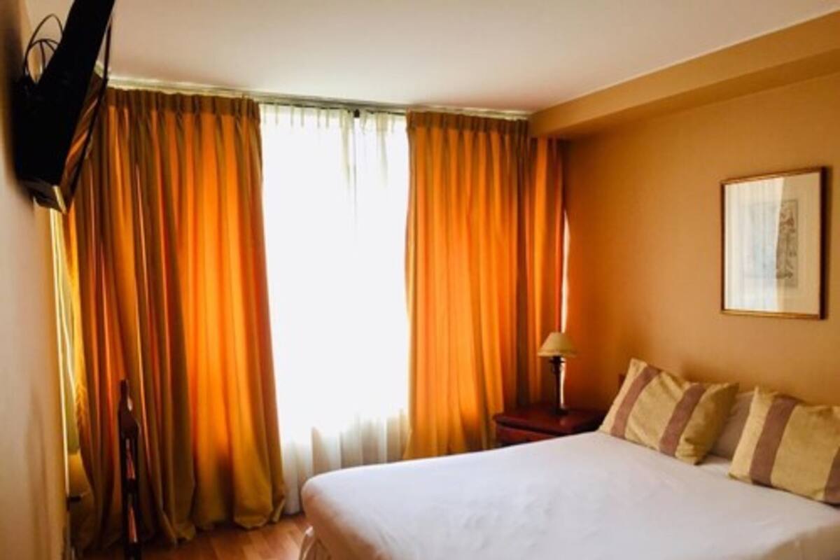 Departamento, 1 cama King size y sofá cama | 2 habitaciones, minibar y caja de seguridad en la habitación