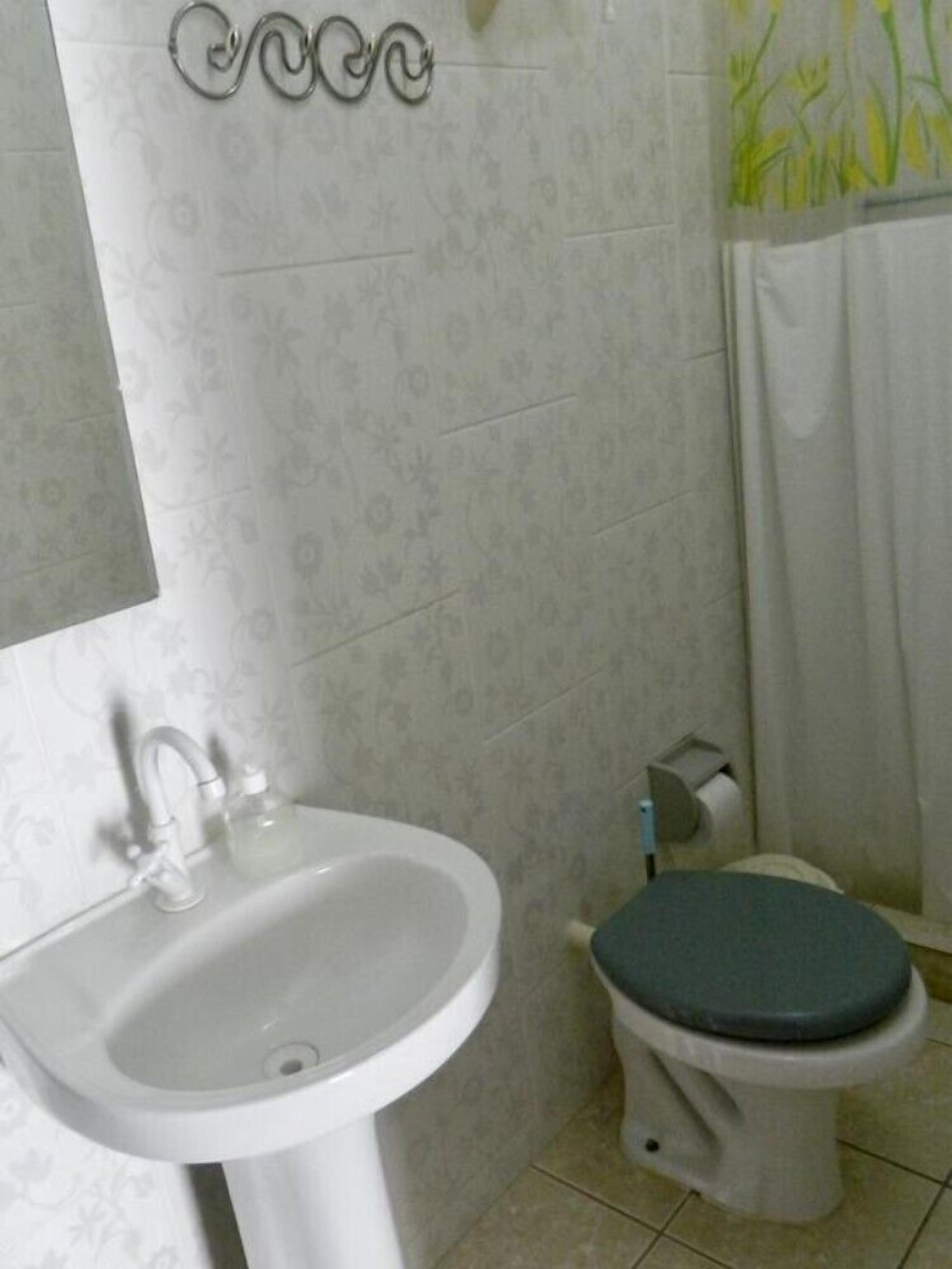 Economy Double Room | Bathroom | Free toiletries, towels