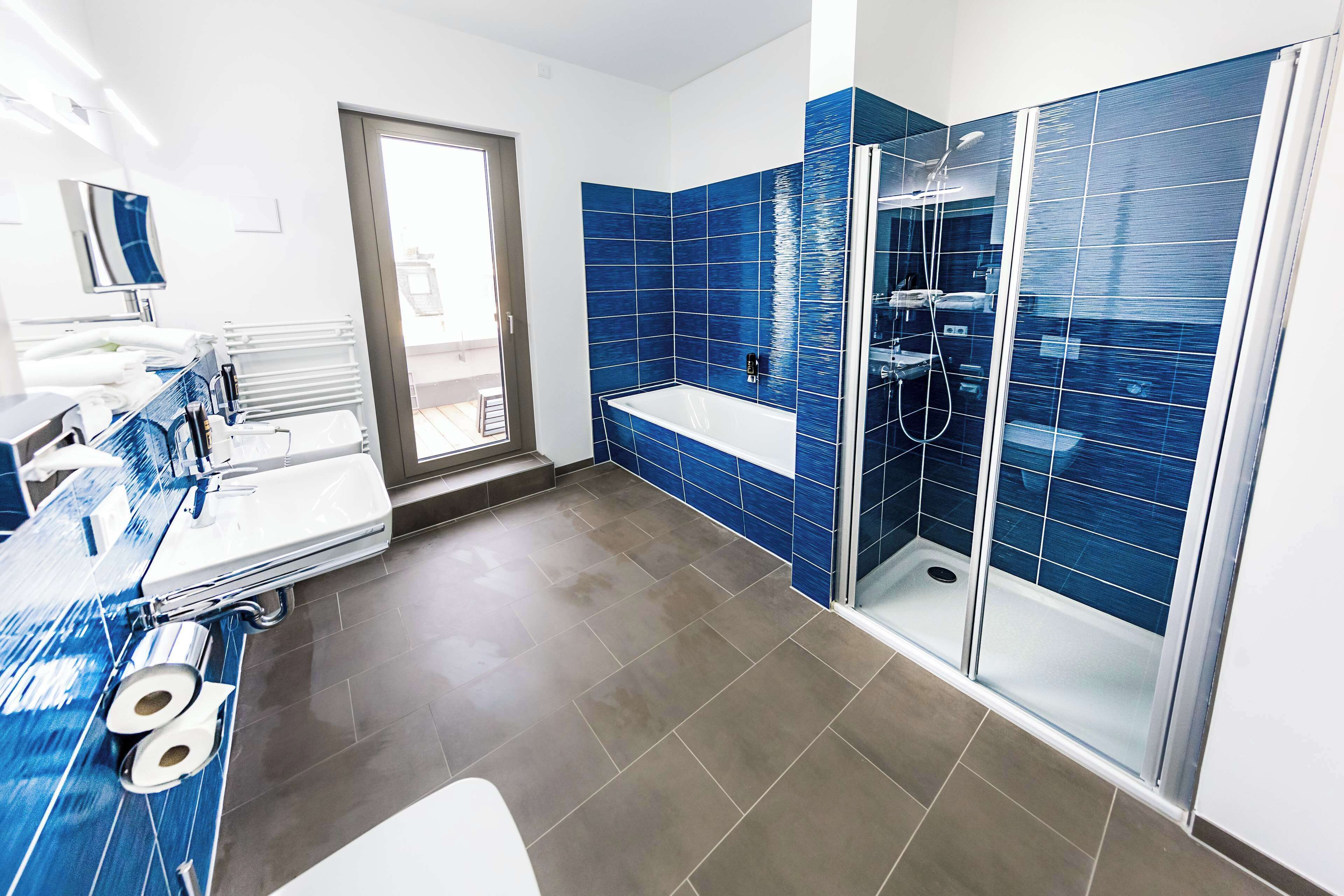 suite, multiple beds, balcony (with sofabed) | bathroom | free toiletries, hair dryer, towels