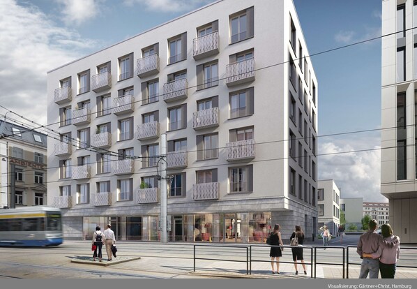 A modern building with multiple balconies and large windows, likely a hotel or apartment complex. - Best Western Plus Royal Suites (Leipzig)