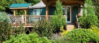 Glamping at its finest - riverfront yurt, 30-minutes west of Asheville