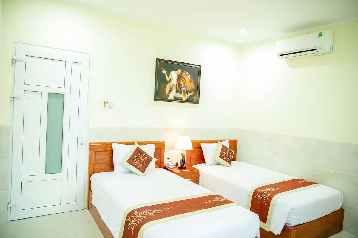 Kamar Twin Deluks | Minibar, meja kerja, kedap suara, dan tempat tidur lipat/tambahan
