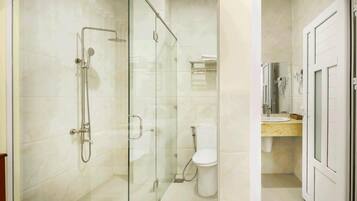 Shower, free toiletries, slippers, towels