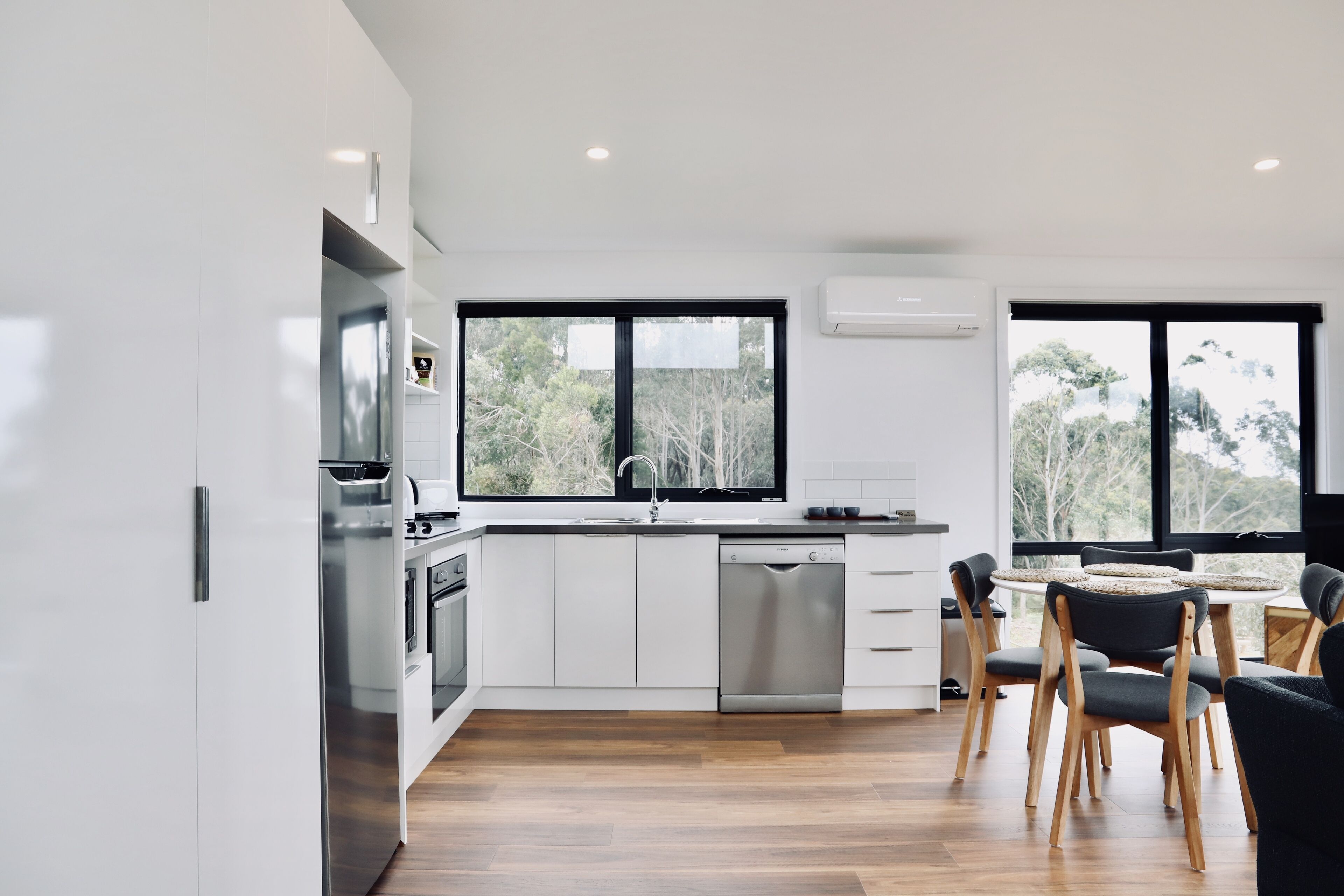 Departamento Deluxe | Área de sala de estar | Televisión de pantalla plana 