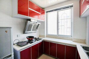 Suite de diseño, 2 camas de matrimonio, no fumadores | Cocina básica privada | Hervidor eléctrico