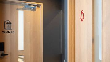 Shower, free toiletries, slippers, towels