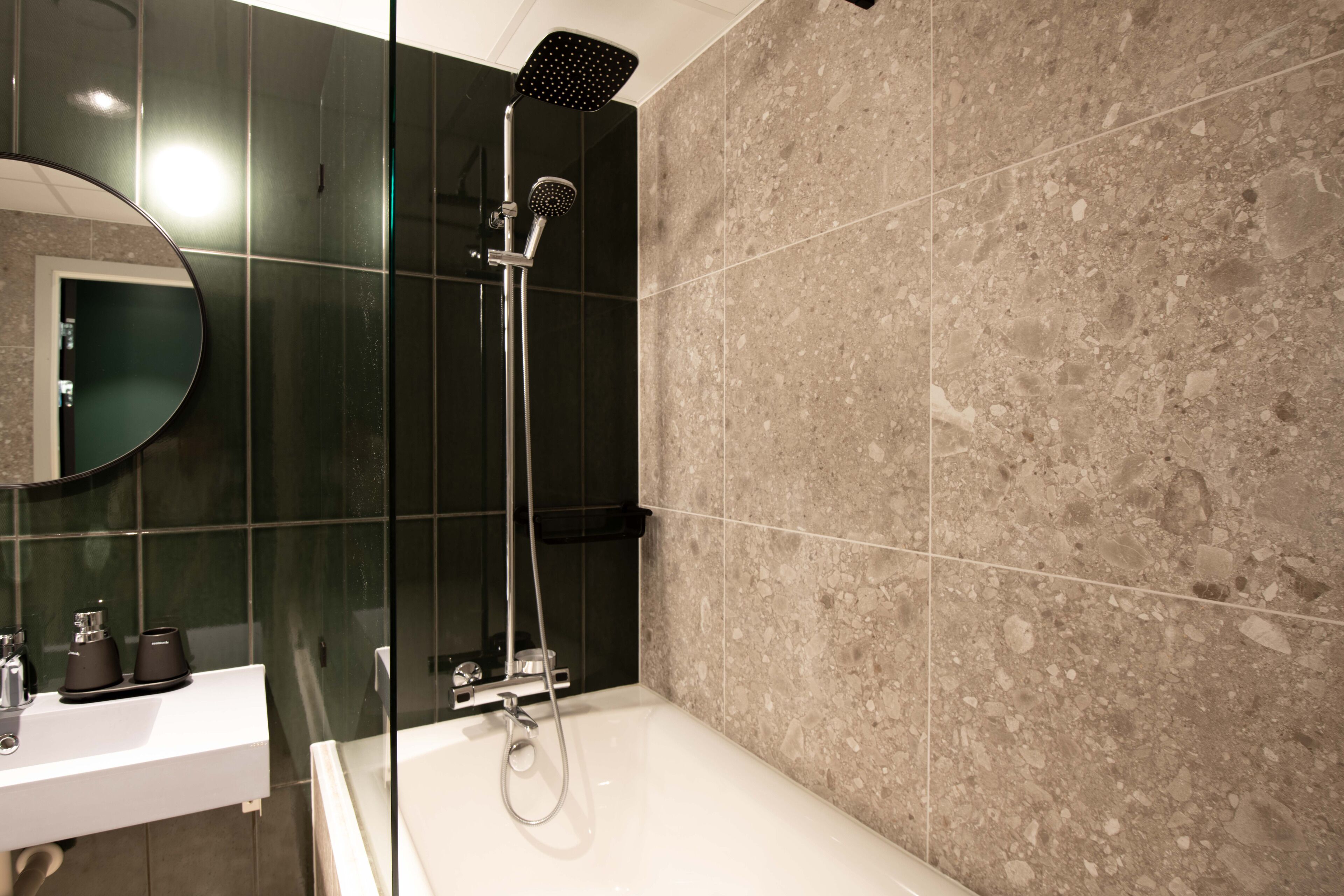 junior suite | bathroom | shower, rainfall showerhead, hair dryer, towels