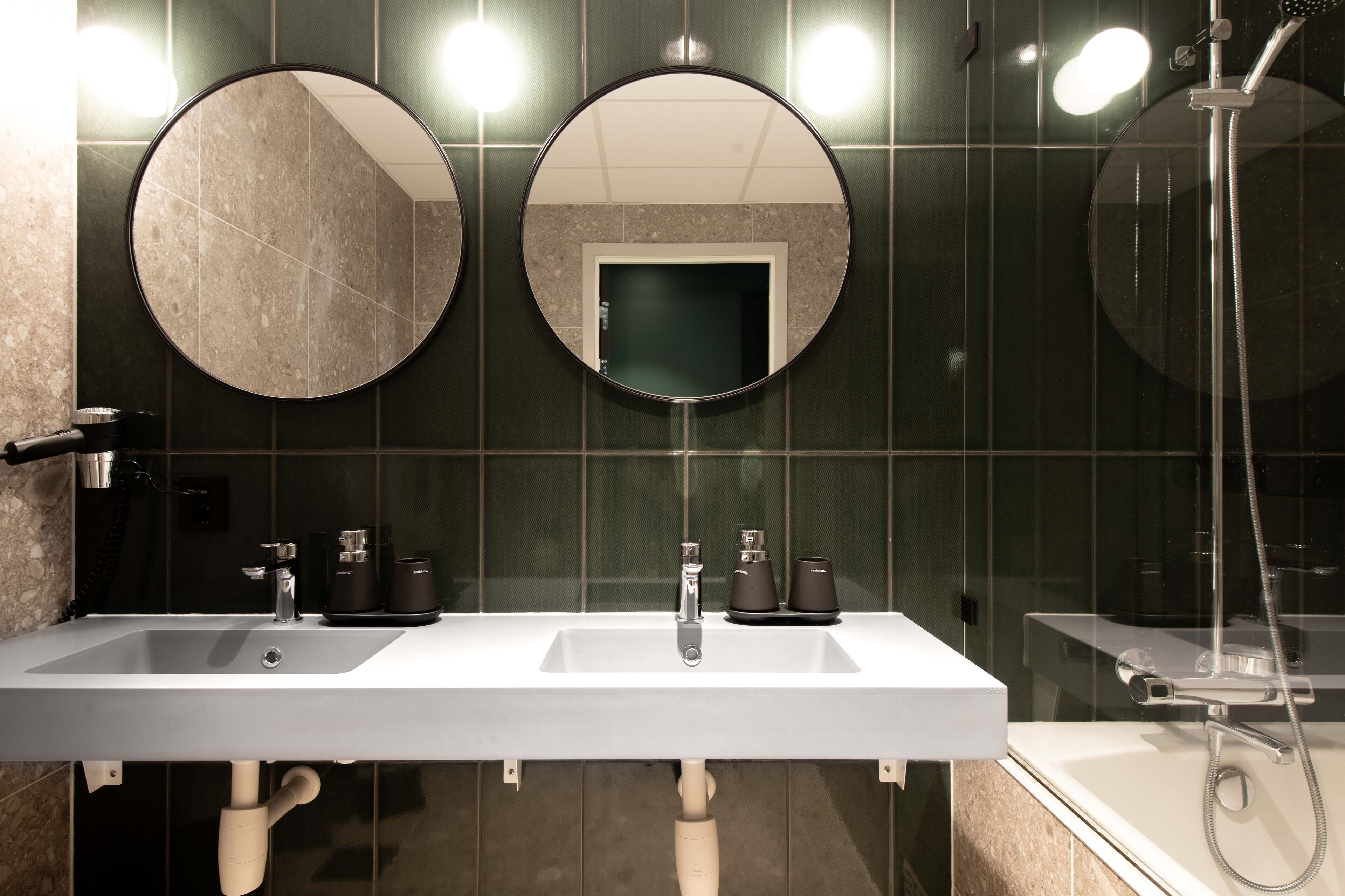 junior suite | bathroom | shower, rainfall showerhead, hair dryer, towels