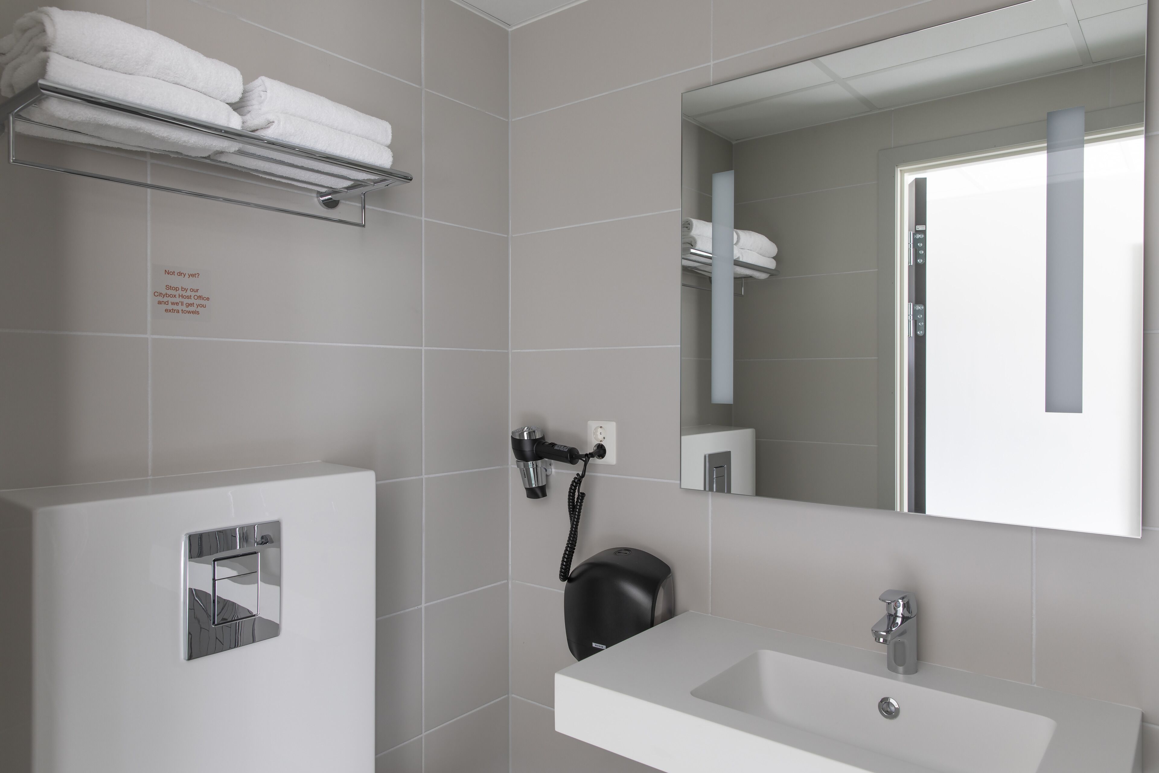 shower, rainfall showerhead, hair dryer, towels