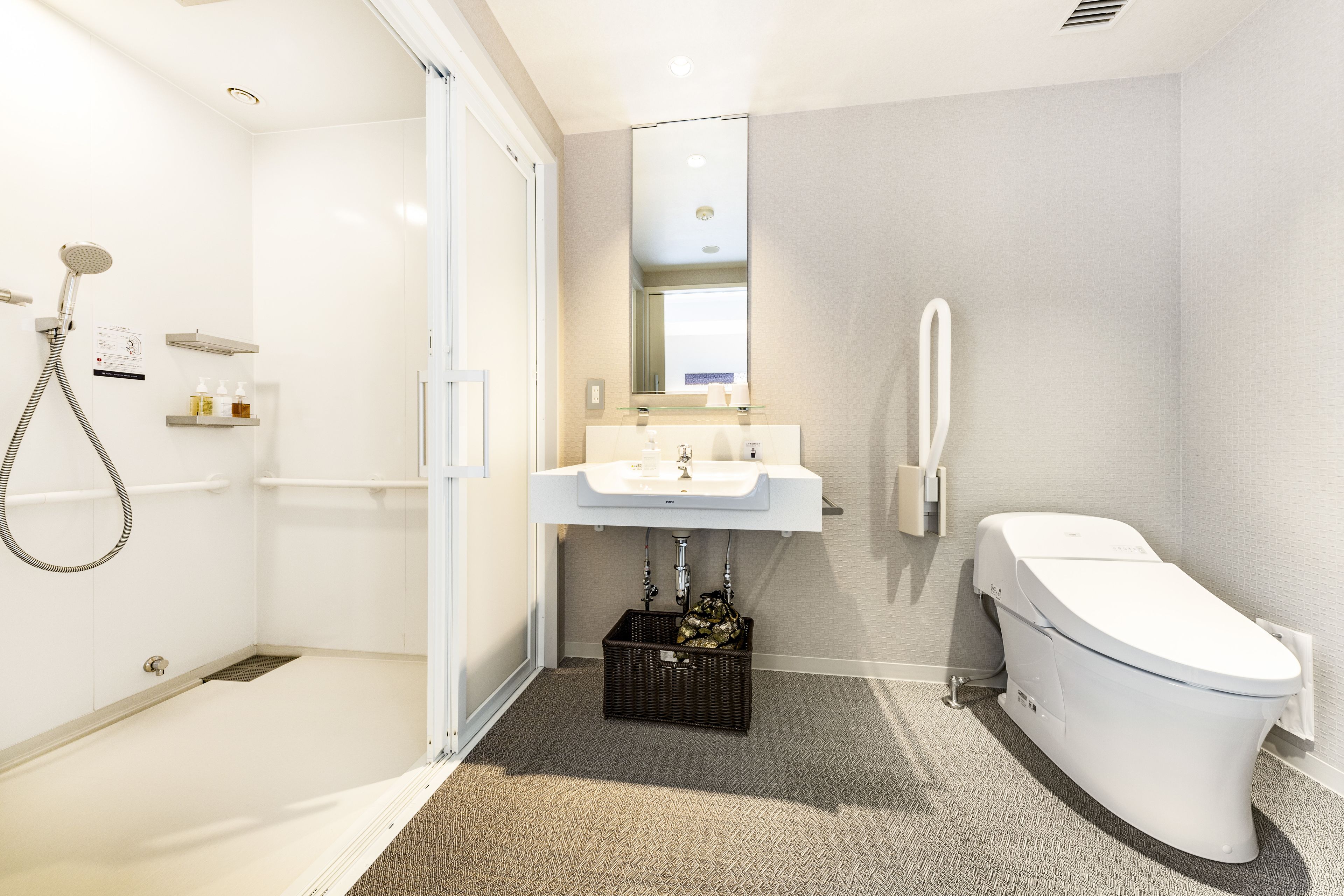 universal twin non-smoking, shower booth only | bathroom | free toiletries, hair dryer, slippers, electronic bidet