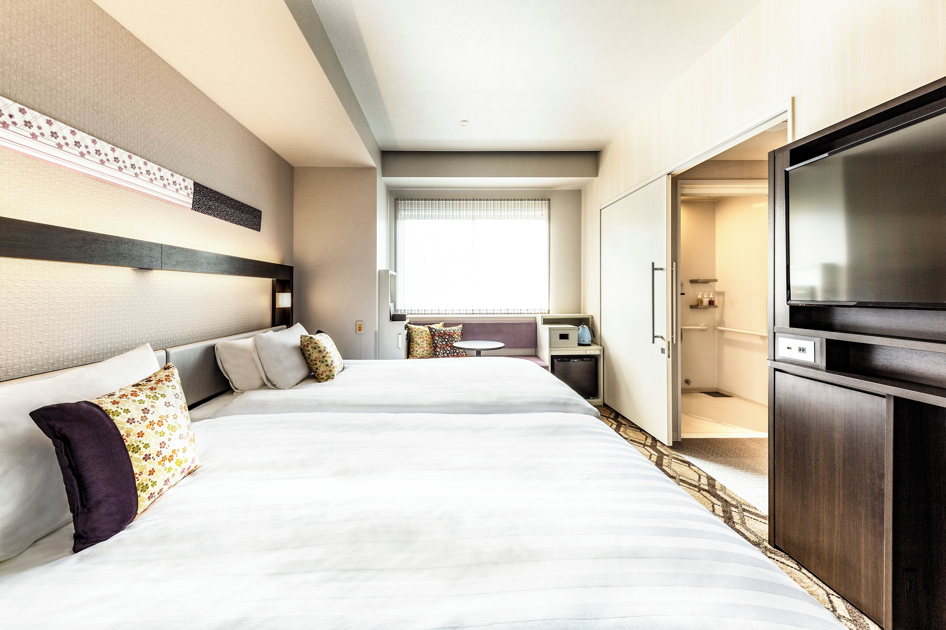 universal twin non-smoking, shower booth only | in-room safe, individually decorated, desk, blackout curtains