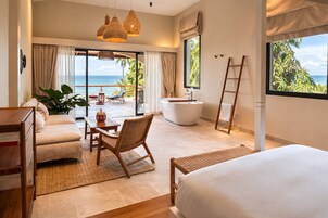 Premium Beach Front with Patio | In-room safe, desk, laptop workspace, blackout drapes