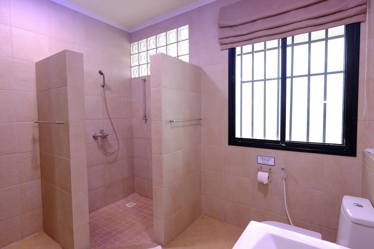 poolside seaview room | bathroom | shower, free toiletries, hair dryer, towels