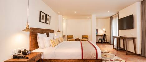 Junior Suite, 1 King Bed, Non Smoking, City View | Free WiFi, bed sheets