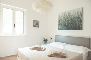 Apartamento, en la zona del jardín (Ulivo) | Edredones de plumas, caja fuerte, cortinas opacas