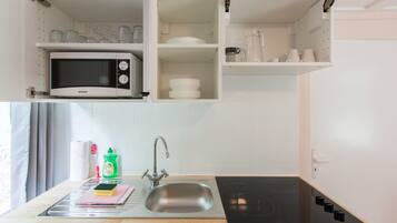 Bungalow, 1 Bedroom | Private kitchen | Full-sized fridge, oven, stovetop, coffee/tea maker