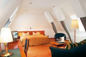 Suite | Een minibar, een bureau, een strijkplank/strijkijzer, gratis babybedden