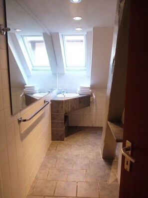 Suite | Bathroom | Deep soaking tub, rainfall showerhead, free toiletries, hair dryer