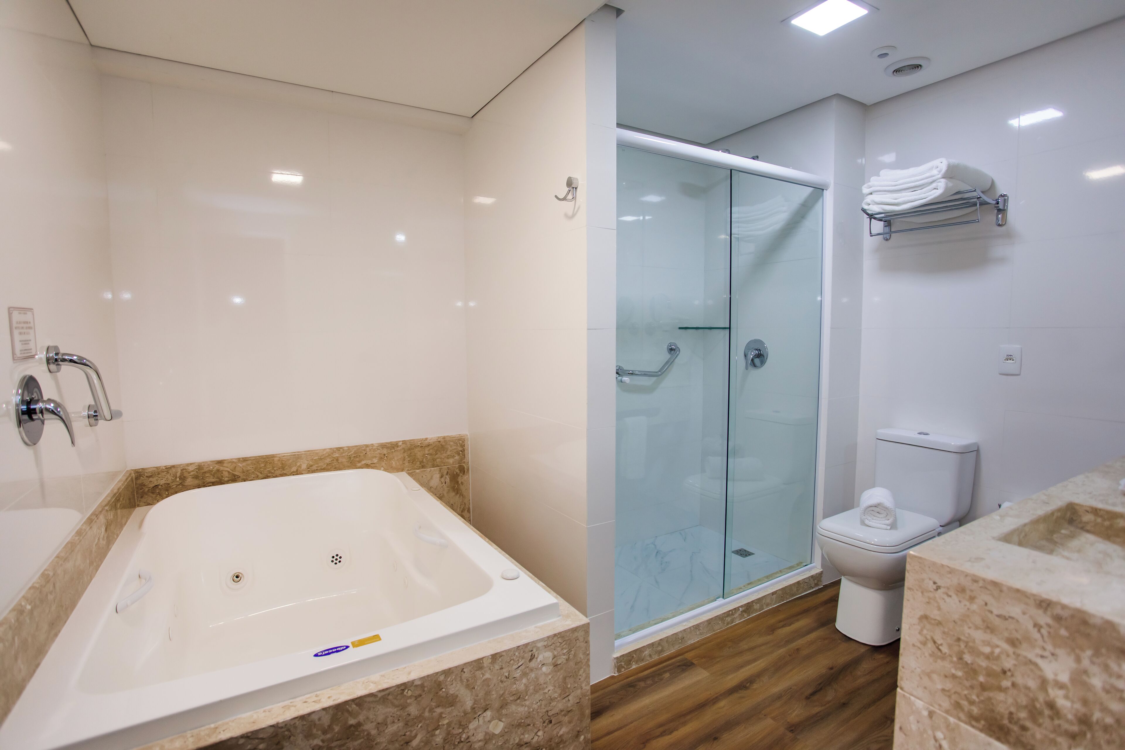 grand suite (luxury) | bathroom | combined shower/bathtub, hair dryer, towels, soap