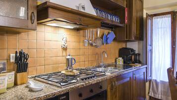 Apartment, 2 Bedrooms | Private kitchen | Full-size fridge, microwave, oven, stovetop