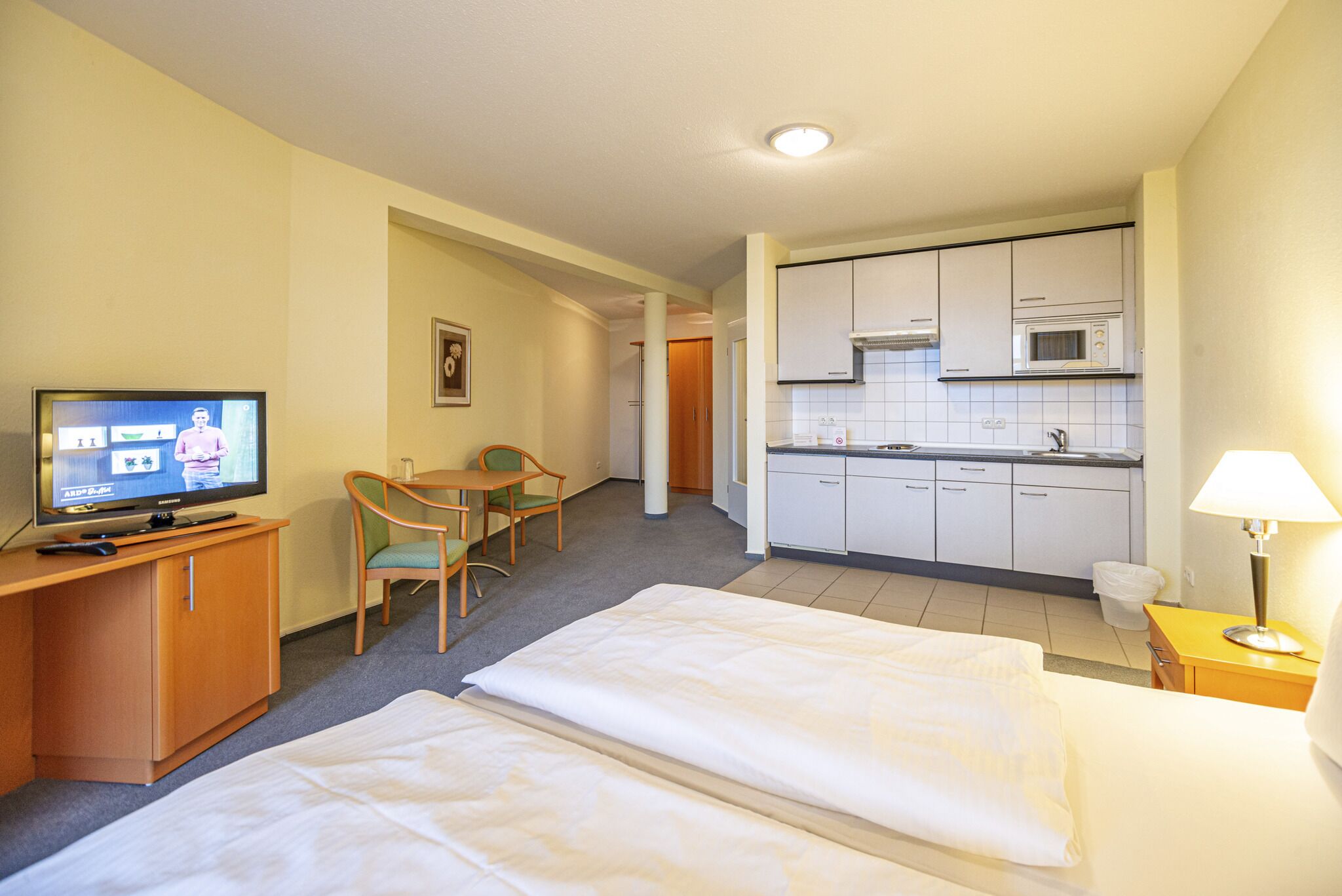 studio - adjacent building | living area | flat-screen tv