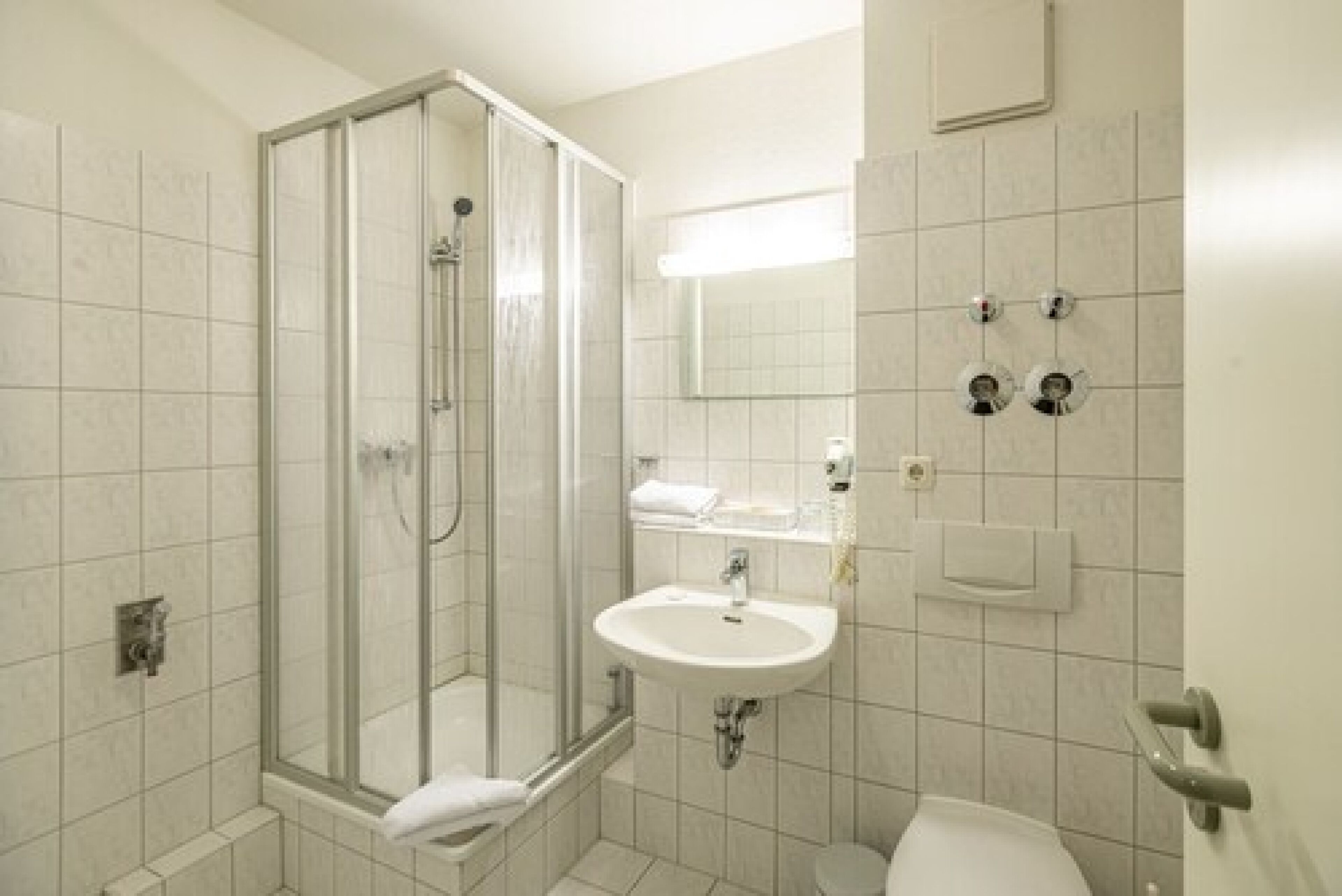 family apartment | bathroom | shower, hair dryer, towels