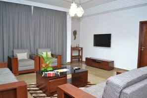 Family Apartment, 5 Bedrooms, Non Smoking | Living area | Flat-screen TV - Residence Maryka II (Cotonou)
