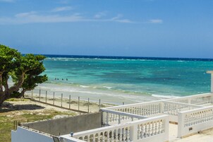 On the beach, sun loungers, beach towels