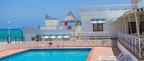 Outdoor pool, sun loungers