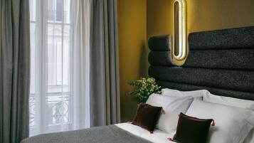 Luxe beddengoed, een kluis op de kamer, een bureau