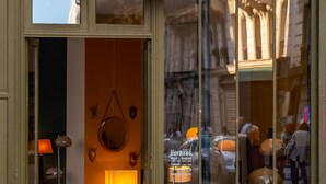 A storefront with a sign reading "COIN canal". - La Planque Hôtel (Paris)