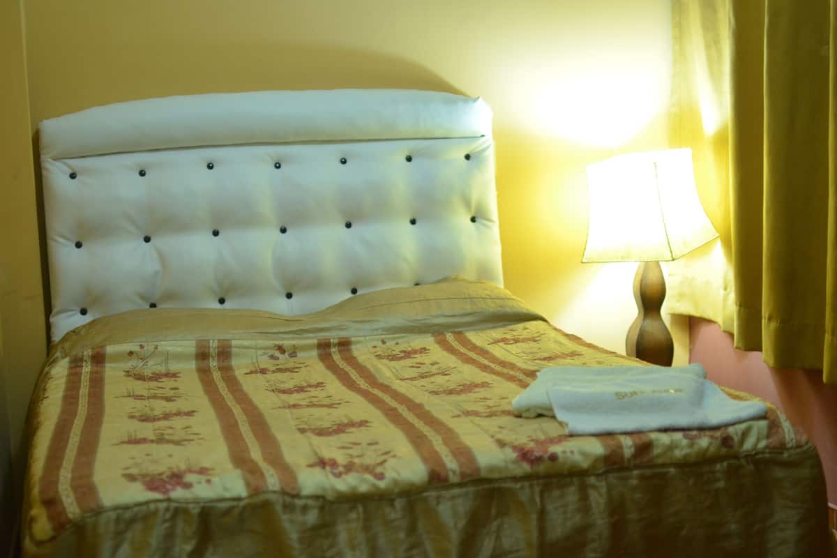 Classic Single Room, 1 Large Twin Bed, Non Smoking | Iron/ironing board (on request), WiFi (free), bed sheets
